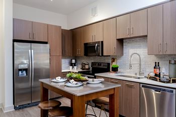 Gourmet chef kitchens with stainless steel appliances